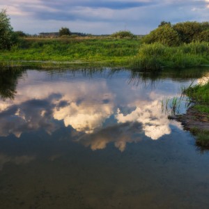 Облака в реке купаются